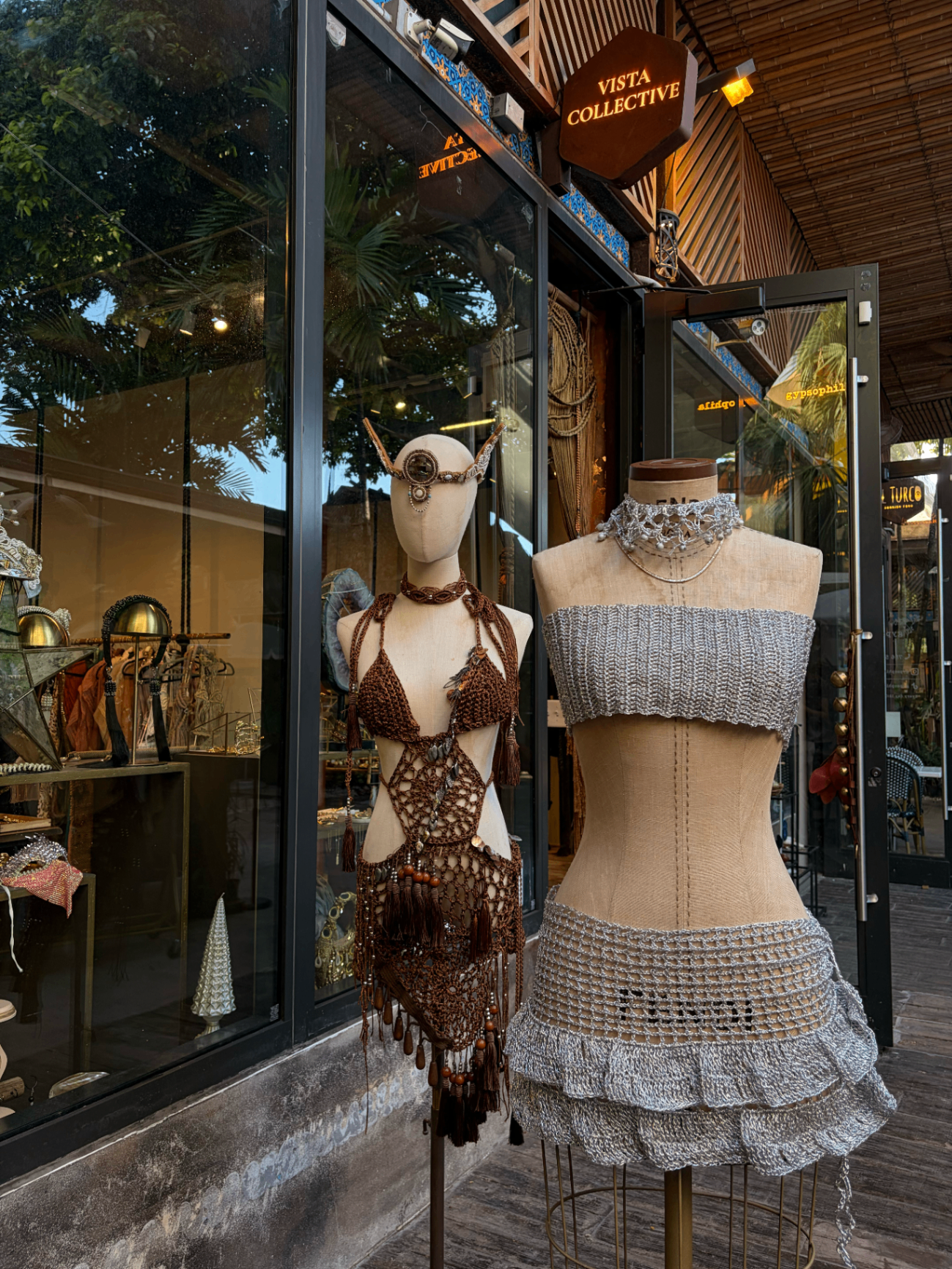 Vista Collective storefront with artisan crochet and knit pieces on mannequins